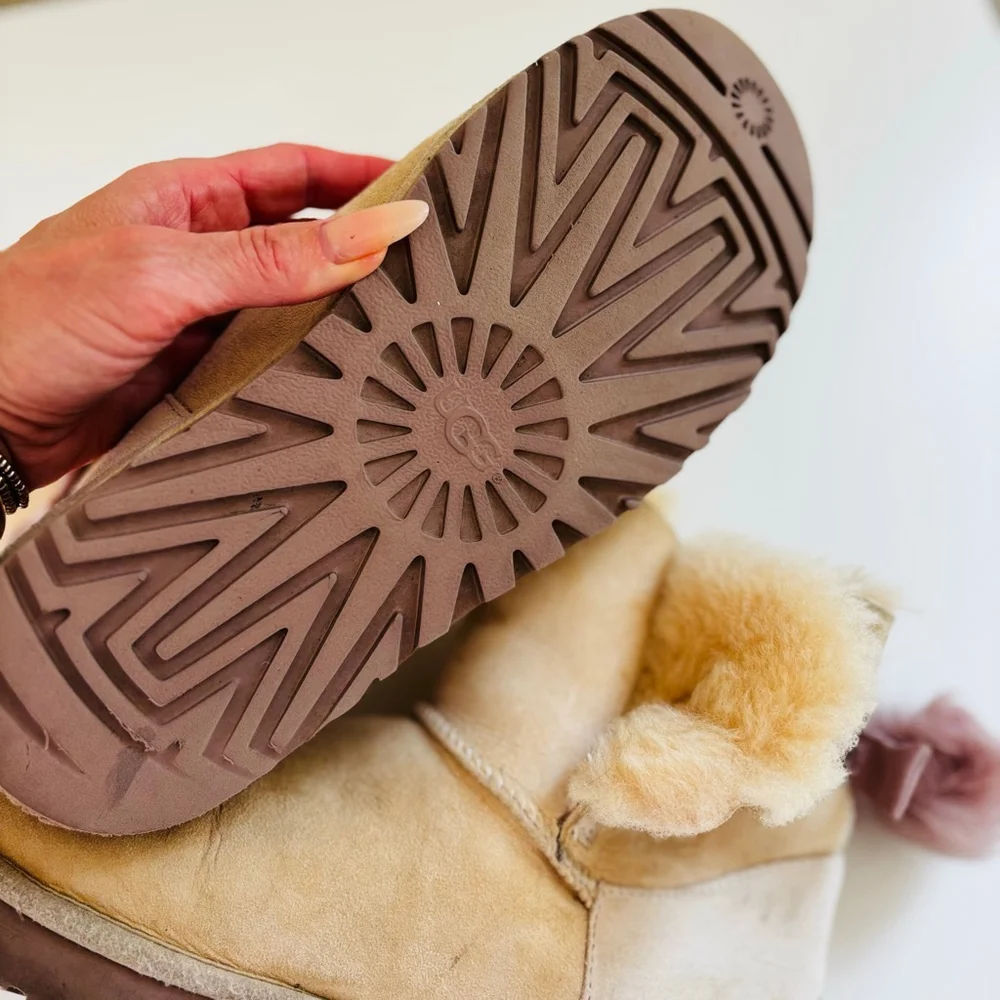 UGG Beige Sheepskin Winter Boots with Pink Pom Poms